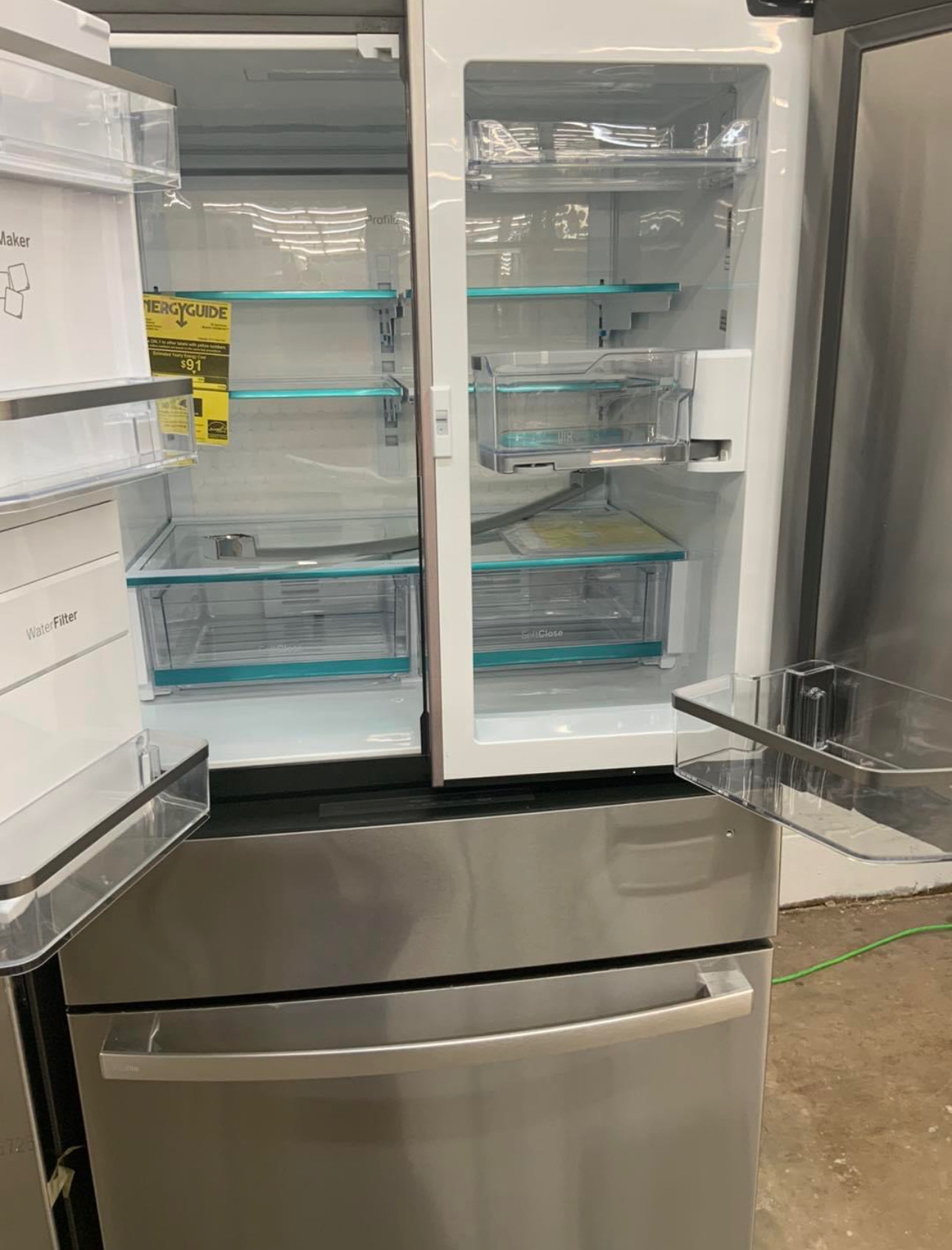 ge 27.9 cu. ft. 4 door french door refrigerator with a fingerprint resistant stainless steel finish