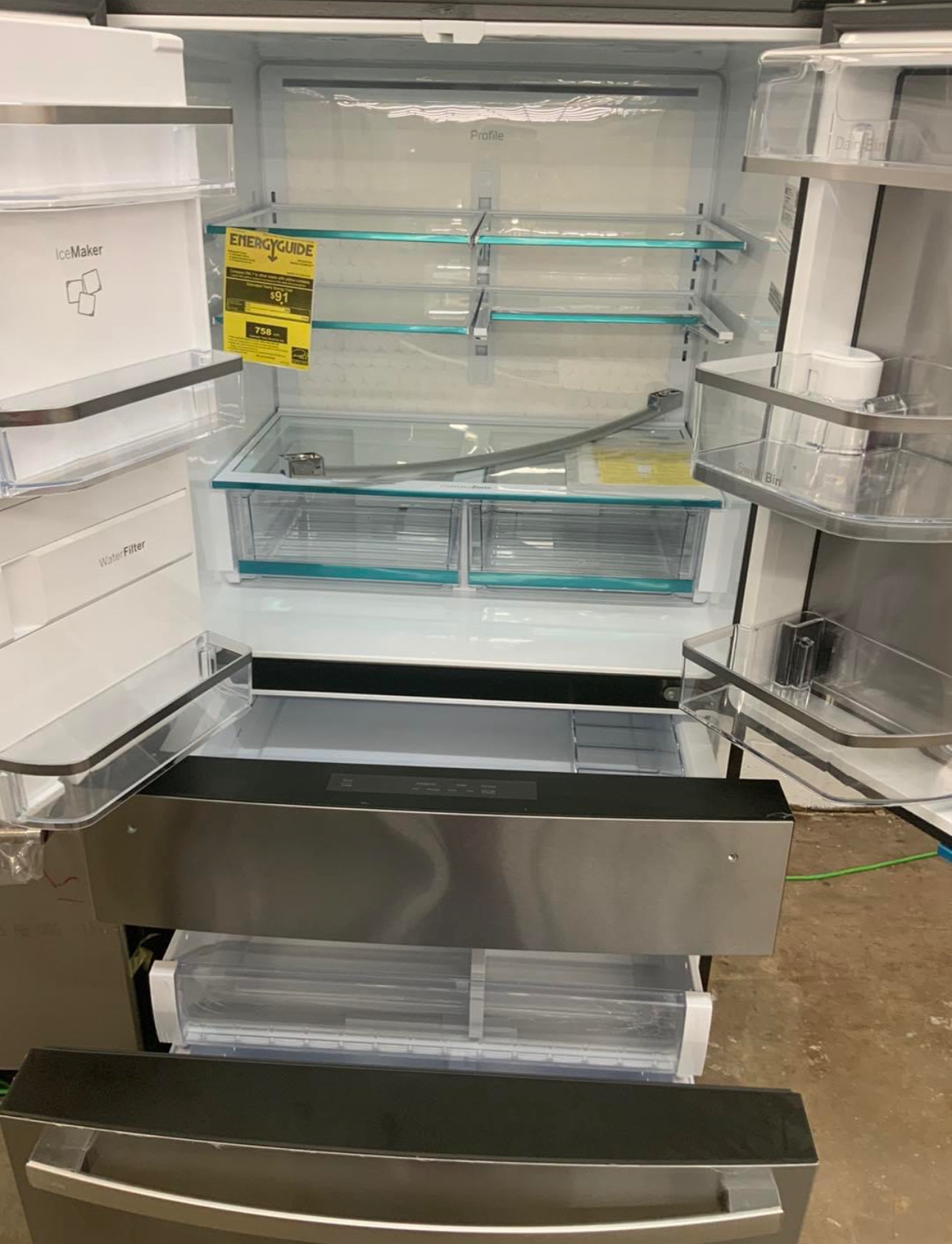 ge 27.9 cu. ft. 4 door french door refrigerator with a fingerprint resistant stainless steel finish