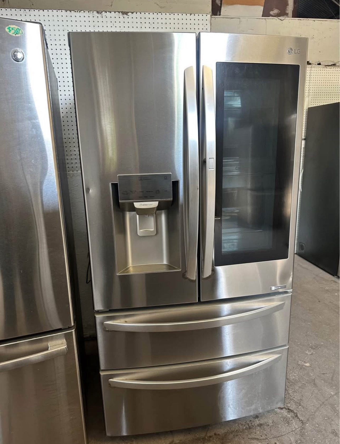 lg 36 inch, 27.8 cu. ft., french 4 door smart refrigerator featuring an instaview® door in door® panel, an integrated ice and water dispenser, and wi fi connectivity.