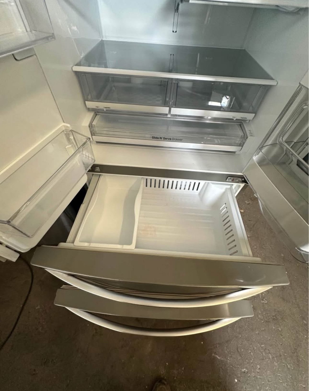 lg 36 inch, 27.8 cu. ft., french 4 door smart refrigerator featuring an instaview® door in door® panel, an integrated ice and water dispenser, and wi fi connectivity.