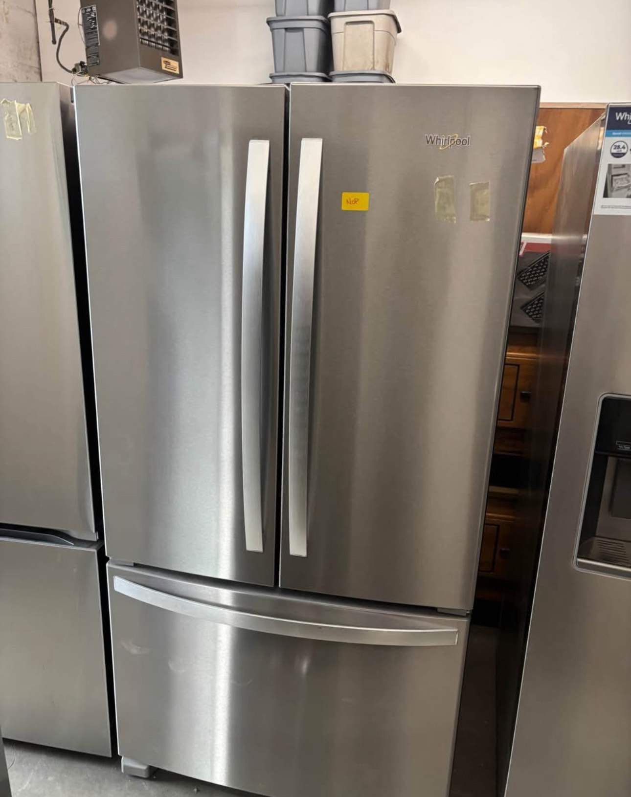 whirlpool 26.8 cu. ft. french door refrigerator with a fingerprint resistant stainless steel finish and exterior filtered ice and water dispenser